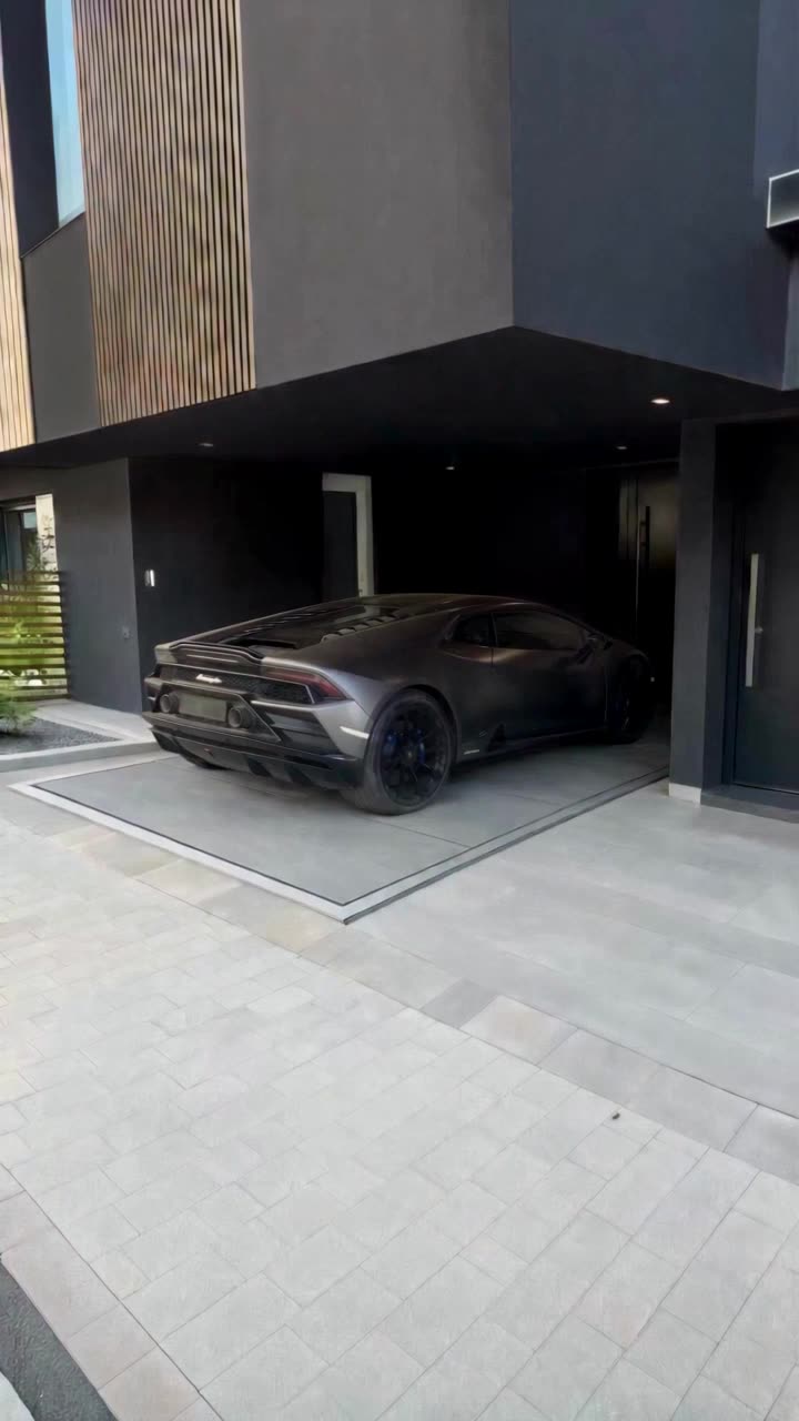 Modern Black Garage Lift Crush — Seedance 2.5